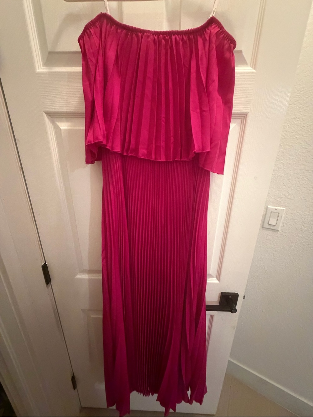the clothing company Fuchsia Strapless Pleated Maxi Dress